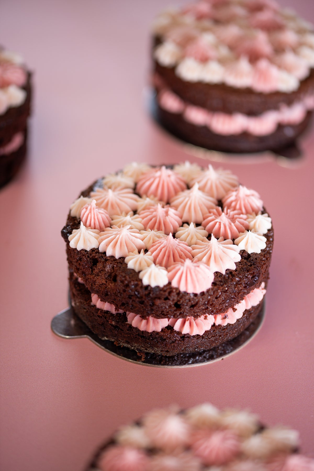 Mini chocolate cake with white chocolate & raspberry buttercream